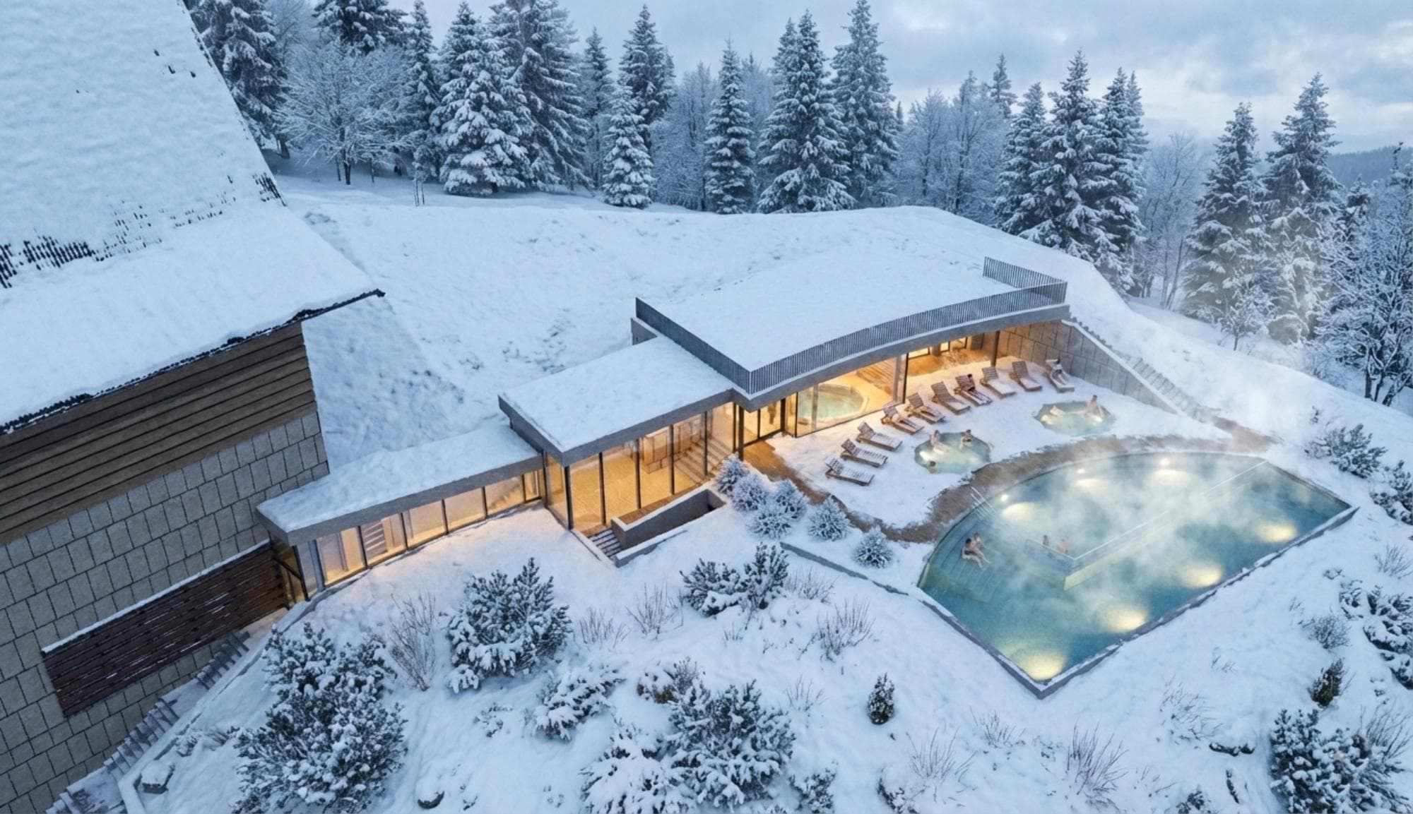 Radisson Blu Zakopane — widok z góry na zewnętrzne baseny termalne w zimowej scenerii